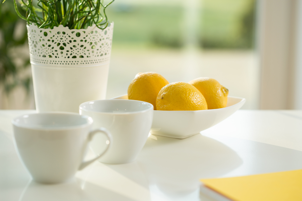 Lemons and coffee cups